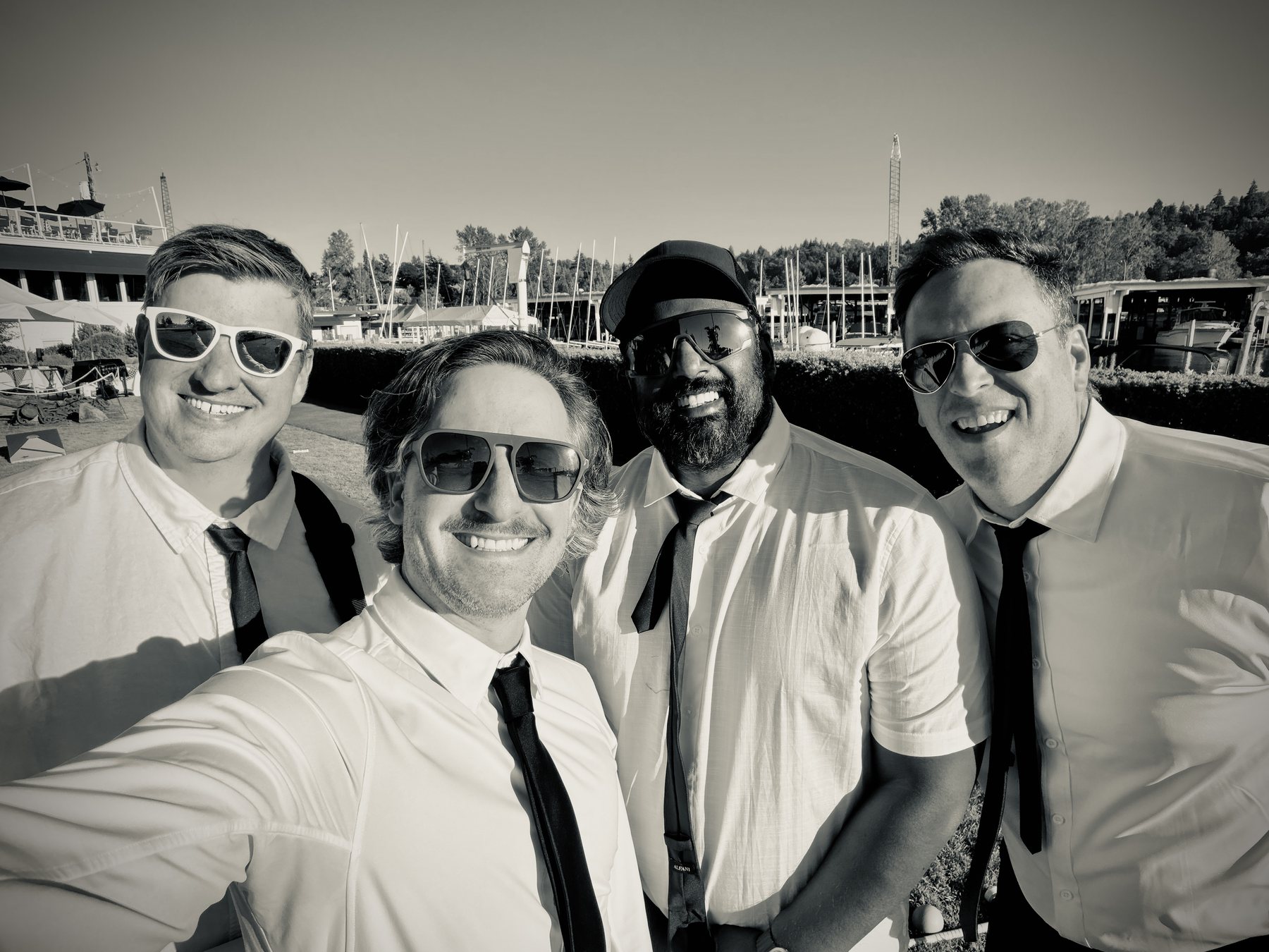 Between 2 Gregs band portrait at the marina