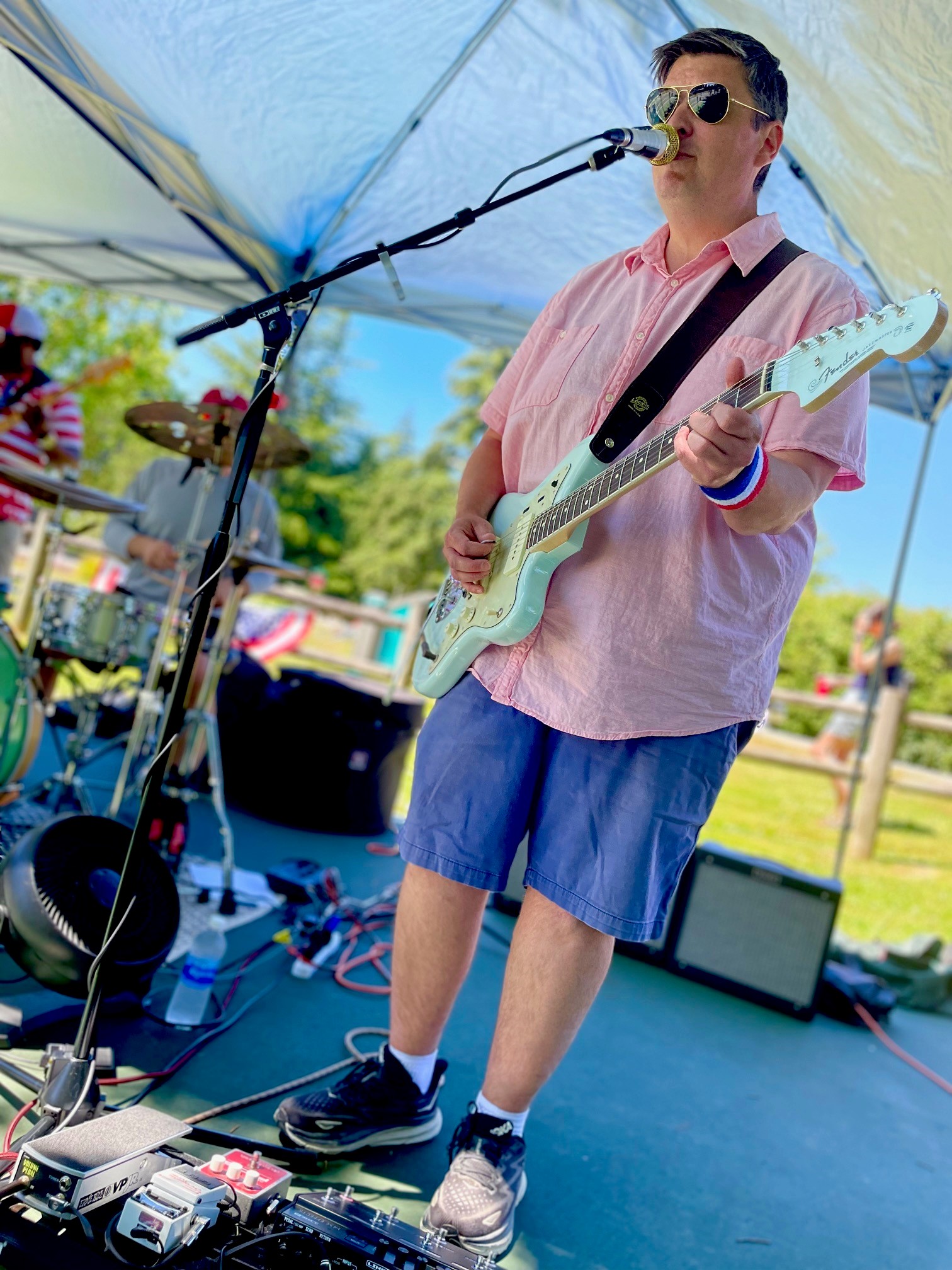 Greg Tomlin playing guitar